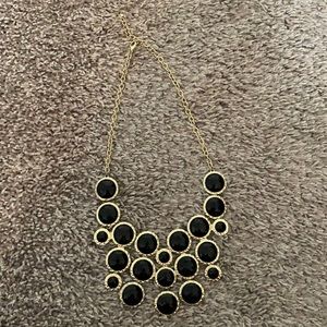 Adjustable black and gold necklace